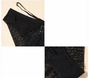 Black lace women panties detail shot featuring fine straps and pure breathable cotton crotch.