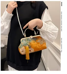 New Chinese style silk floral handbag with pearl chain and tassel pendant for elegant women.