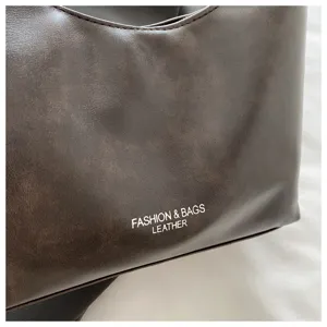 Brown leather shoulder crossbody bag, casual vintage dumpling bag for women commute.