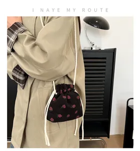 Cute strawberry corduroy bucket bag stylish mini shoulder and crossbody bag daily details view.
