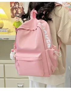 Pink casual school backpack for students, large capacity daily book bag with cute keychain charm.
