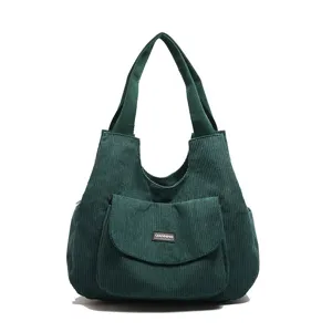 Dark green corduroy tote bag for women, large capacity shoulder bag for casual commuting.