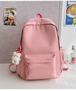 Pink casual student backpack with cute bear pendant, stylish lightweight daily school bag.