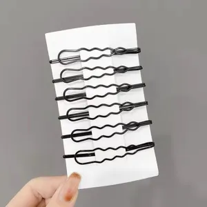 Black wavy bobby pins set on display card, minimalist hair clips for women's daily styling.