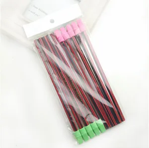 Wooden striped pencil set with eraser stationery supplies in transparent bag packaging.