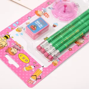 Close-up detail of student stationery set featuring colored pencils and eraser in pink packaging.