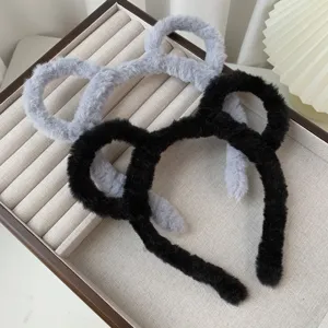 Plush cute ear headband for women, soft furry hair hoop for daily makeup and face washing.