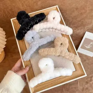 Plush hair claw clip detail shot, fluffy winter shark clip in multiple colors for stylish hair styling.