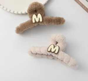 Large plush hair claw clip autumn winter soft furry hair accessory cute letter design detail.