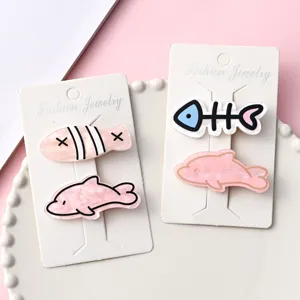 Jolies barrettes en acrylique avec motifs de poissons et dauphins pour coiffures mignonnes.