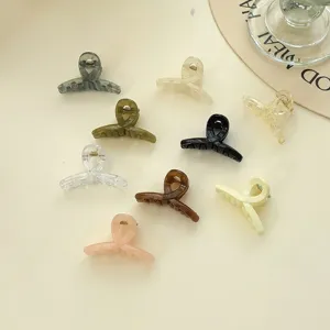 Mini cute 4.5cm hair claw clips set, translucent cross design shark clips for styling hair.