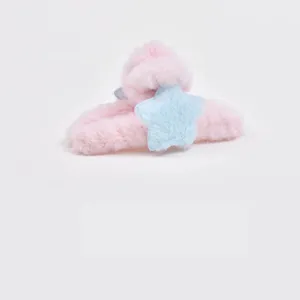 Cute plush star hair claw clip for women, soft pink and blue fuzzy hair accessory for autumn winter.