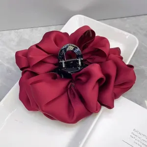 Large red satin flower hair claw clip for women, elegant pleated hairpin for thick hair.