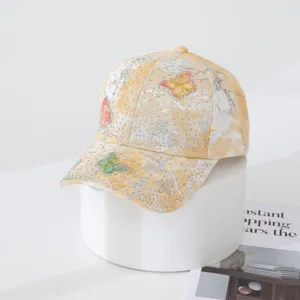 Tie-dye rhinestone butterfly baseball cap, stylish gradient design for sunny days.