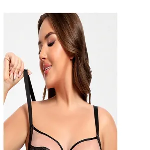 Detailed view of the plus-size black lace bra featuring thin full cups and comfortable straps.
