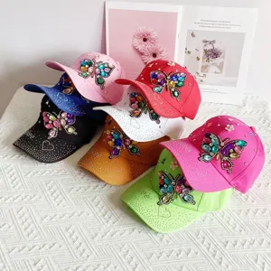 Colorful rhinestone butterfly baseball cap detail showcasing sparkling crystals and vibrant shades.