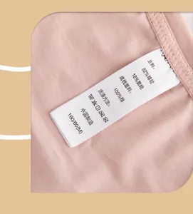 Detail shot of women's underwear care label showing soft cotton crotch and fabric composition.