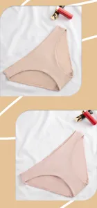 Detailed showcase of seamless women mid-waist briefs in soft solid colors with smooth fabric.