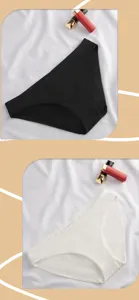 Detail view of seamless mid-waist cotton briefs in black and white, comfortable breathable daily wear.
