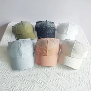 Detailed view of trendy women rhinestone baseball hats with starry sky design, multi-color.