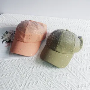 Detail shot of women's rhinestone half-empty top baseball cap, stylish and sparkling sun hat.