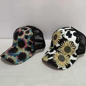 Sunflower and cow print trucker hats featuring breathable black mesh backs for casual outdoor wear.