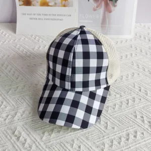 Black and white gingham trucker hat with breathable mesh back, stylish outdoor casual cap.