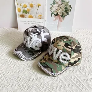 Camouflage baseball hat for women with pearl rhinestone LOVE patch and brim decoration.