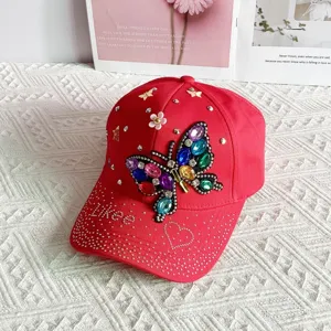 Fashion rhinestone butterfly baseball cap for women, stylish sun hat for outdoor leisure and travel.