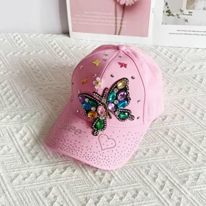 Pink rhinestone butterfly baseball cap for women, stylish sun protection outdoor sports hat.