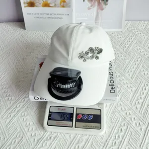 White quick-dry baseball cap with rhinestone butterfly, sun protection hat with solar fan.