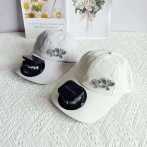 Quick-drying baseball cap with solar fan and rhinestone butterfly decoration for summer sun.