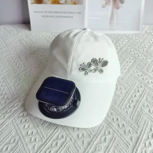 White quick-drying baseball cap with rhinestone butterfly and solar fan for sun protection