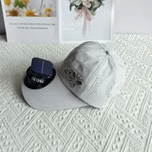 Detailed view of the sun protection quick-dry baseball cap with solar fan and rhinestones.