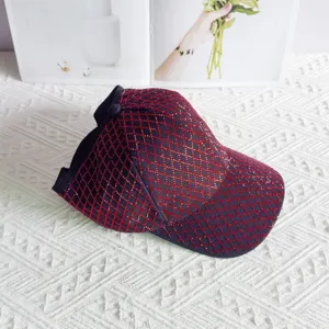 Detail view of the luxury rhinestone diamond pattern half-empty top baseball cap for women.