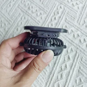 Detail view of the rechargeable clip-on fan module with Type-C port for sun hat.
