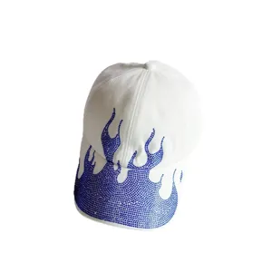 White baseball cap with blue rhinestone flame pattern, stylish street style sun hat for outdoor use.