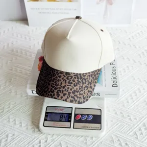 Unisex leopard print panel baseball hat, stylish cotton casual sun visor cap for daily wear.