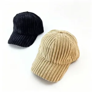 Corduroy baseball cap detail view showing soft fabric texture and curved brim winter hat
