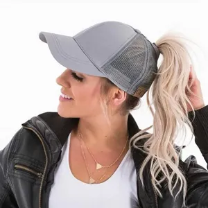 Grey ponytail baseball cap detail, mesh back breathable trucker hat for women outdoor sports.