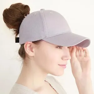 Detail view of the solid grey ponytail baseball cap with a convenient back opening design.