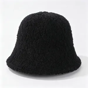 Detailed view of the cozy black fleece bucket hat, soft texture for winter warmth and comfort.