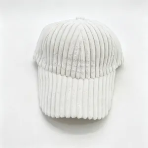 Close-up view of the white thick corduroy texture and curved brim detail of the baseball cap.