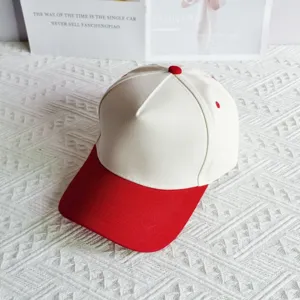 Detailed close-up view of white and red colorblock five panel baseball cap cotton