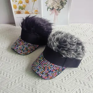 Close-up detail of novelty rhinestone visor hat with furry wig hair, street hip-hop style.