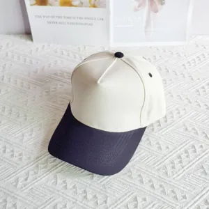 Two-tone baseball cap with off-white crown and dark blue brim plain cotton sun hat