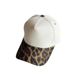 White cotton baseball cap with leopard print brim, five-panel trucker sun hat for outdoor wear.