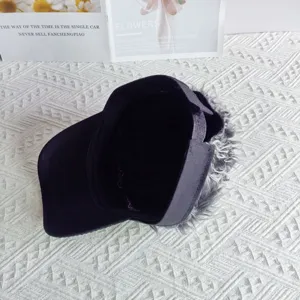 Detailed view of street style baseball cap with wig hair extension, cool fashion design.