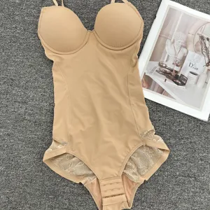 Seamless nude body shaper bodysuit with built-in bra and lace trim for postpartum tummy control.
