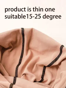 Detailed view of thin translucent tights fabric with neat black stitching, suitable for spring.
